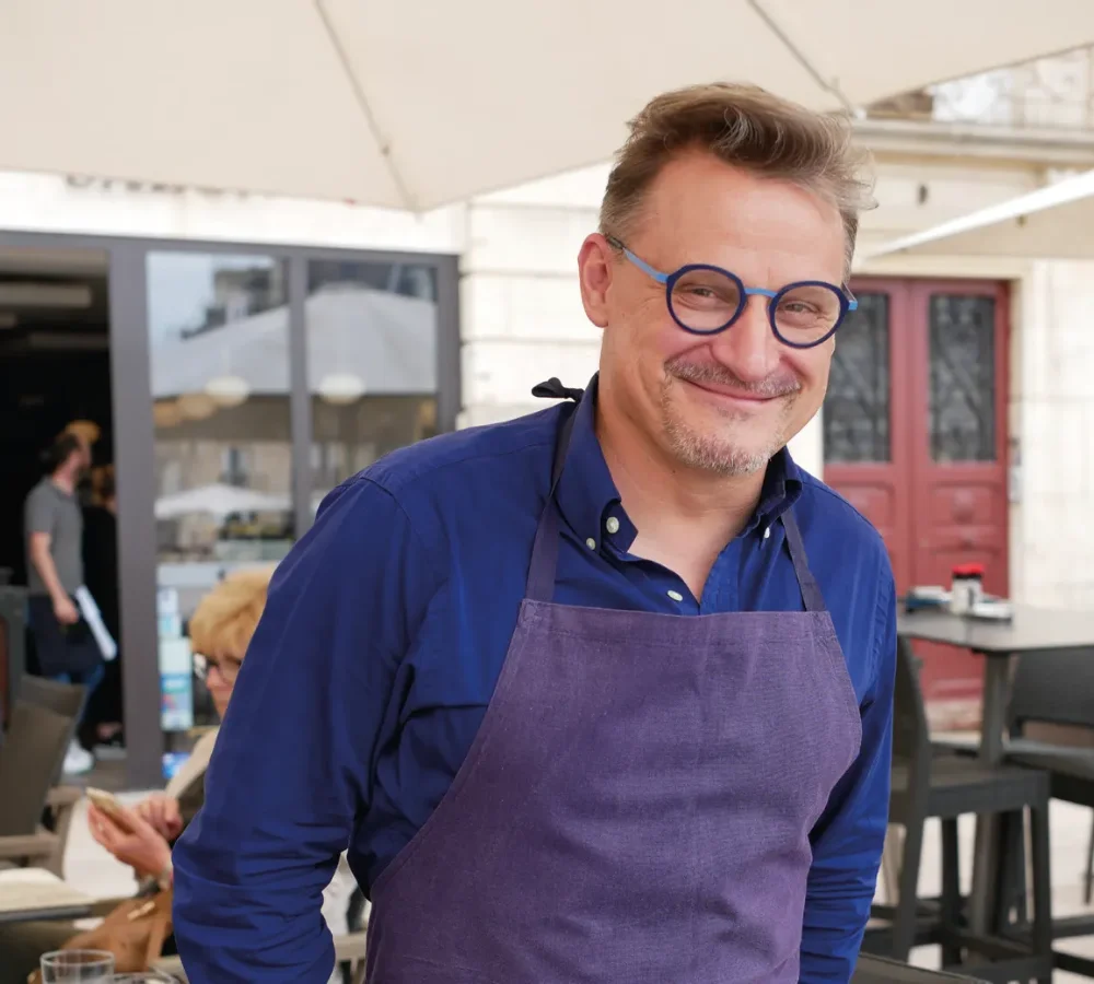 Guillaume Bortolussi, founder of Café Gourmand, on the restaurant terrace in Dijon.